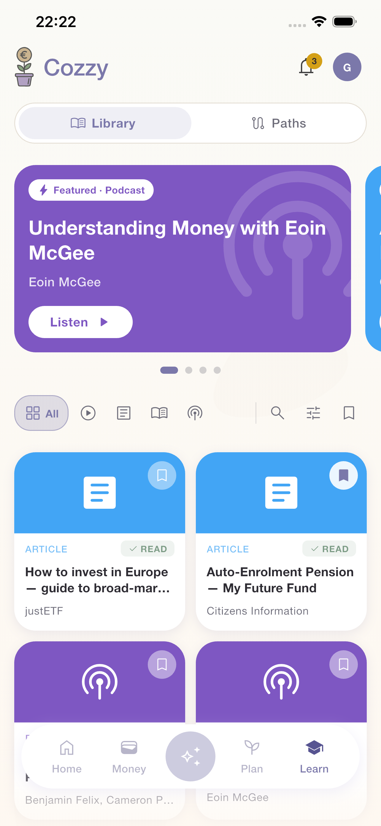 Cozzy Learn tab showing 'Money Doctors 2026' as a featured book by John Lowe and articles including 'Auto-Enrolment in Ireland' and 'Payments to Families and Children'